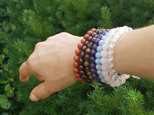 Power Bracelets on outstretched arm