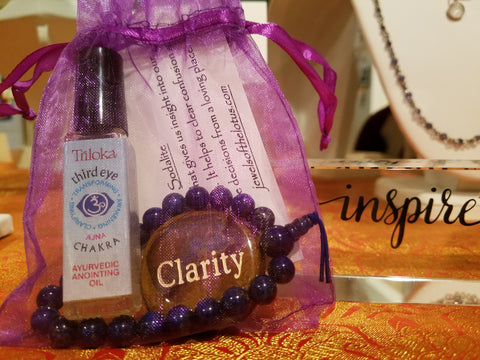 Surprise me crystal kit with power bracelet, annointing oil, word stone, gratitude rock and Organza pouch