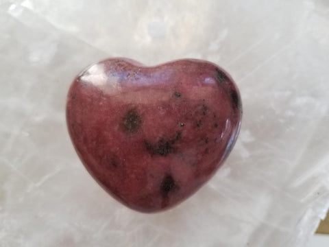 Rhodonite Heart on Selenite Background