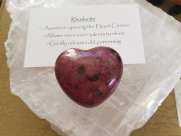 Rhodonite Heart on Selenite Background