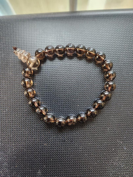 Smokey Quartz Power Bracelet on black background